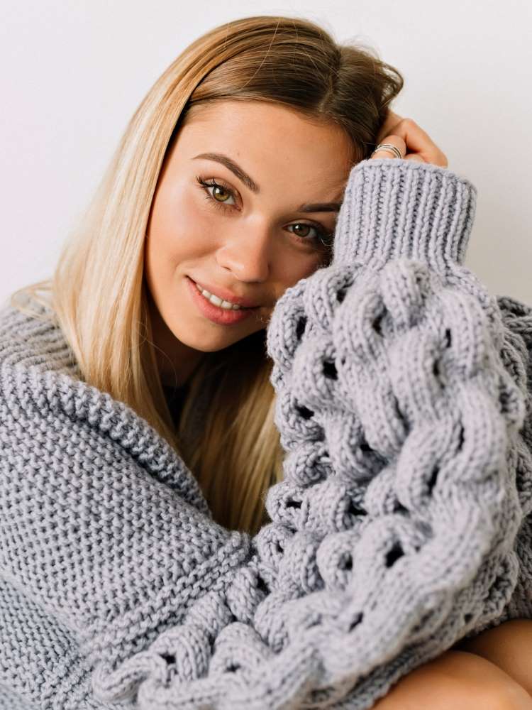 Caring for wool can be a little bit different. It’s quite a delicate and a natural fibre at the end of the day, so it sometimes needs a little more care and consideration than a standard 60-degree wash followed by a fast spin cycle and speed dry. Do you have a jumper that is a bit bothersome when it comes to washing it? Do you find it usually spends anything up to six months at the bottom of the washing basket waiting to be washed and only a month in the wardrobe waiting to be worn?
Money guilt cycle
The true cost of care is not just about your money, it's about your time too. If you already find yourself putting in more time to keep a jumper clean than time spent wearing it, then this is not the right jumper for you and your lifestyle.
But what about the original cost? Have you reconsidered that side as well? I would like to ask you a few questions about it. Did you overspend on this jumper? Did you fall in love with it as soon as you saw it? Was it more than you usually pay for a winter jumper? Then you may have found yourself stuck in what I call a ‘money guilt cycle’.
Did you buy a jumper that fits this description? Do you still have this jumper? Do you wash it, only when you can be bothered? Do you wear it less and less now? Has the cost of care lessened the enjoyment of wearing this item? Because you may have spent more money on it than you normally would have done, you might be keeping it because of the money guilt. Are you reminded of that money guilt every time you see your jumper sat at the bottom of the washing basket, waiting to be washed again? This is the money guilt reminder setting in.
My advice would be to sell it, learn from the lesson and buy better next time, and don’t be fooled by fabulous-looking knitwear that costs the earth but has no realistic way of cleaning and caring for it.
Buying better should always include being able to easily care for an item. Always check the washing instructions before you part with any cash. This is my golden rule.